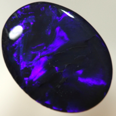 SOLID BLACK OPAL Elegant Blue on Black. Royal blue rolling flashes SEE VIDEO